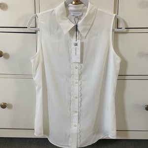 White Calvin Klein button down sleeveless blouse